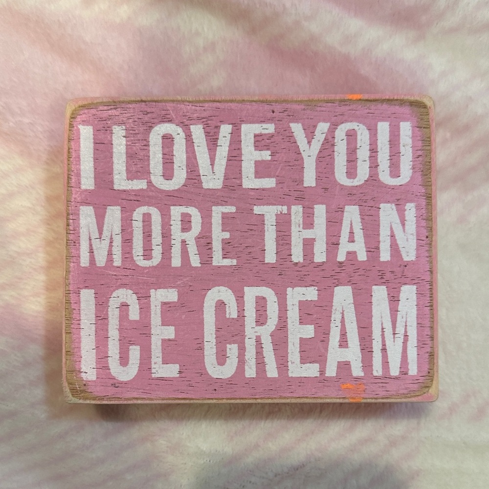 Pink Wooden Sign with White Text
